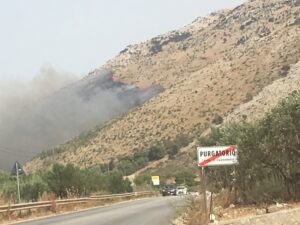 Fire and cars escaping